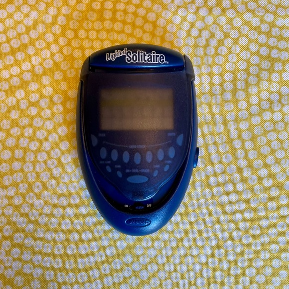 Vintage RADICA Lighted SOLITAIRE 2003 Blue Flip Top Handheld Electronic Game - Picture 1 of 5